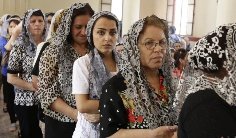 مسيحيو المشرق بين خطر داعش ومخطط تهجيرهم!! (أ ف ب) مسيحيو المشرق بين خطر داعش ومخطط تهجيرهم!! (أ ف ب)