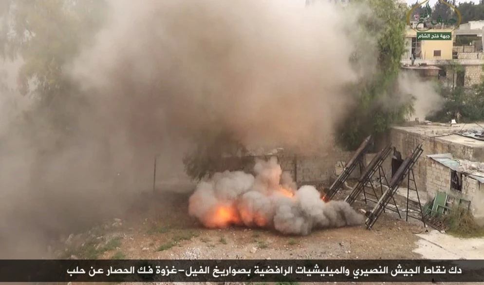 صورة نشرتها جبهة فتح الشام لمجموعة من صواريخ الفيل تقصفها على أحياء حلب الغربية صورة نشرتها جبهة فتح الشام لمجموعة من صواريخ الفيل تقصفها على أحياء حلب الغربية