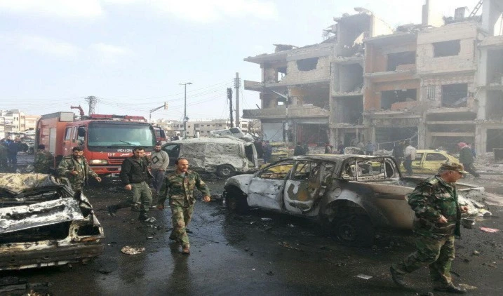 صورة أرشيفية لإحدى التفجيرات في حمص صورة أرشيفية لإحدى التفجيرات في حمص