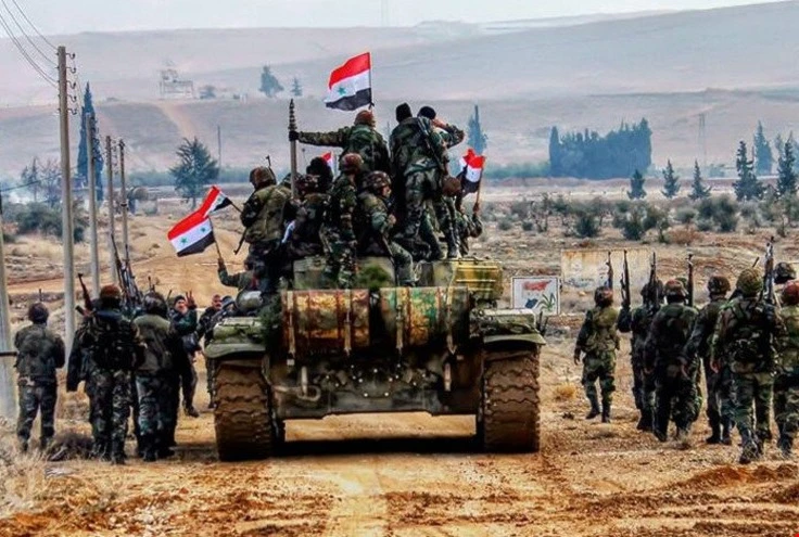 داعش يرفع الأعلام البيضاء فوق مباني مخيم اليرموك والحجر الأسود داعش يرفع الأعلام البيضاء فوق مباني مخيم اليرموك والحجر الأسود