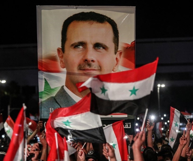 خرج الشعب السوري محتفلاً بفوز الأسد ليقول للعالم"انتهينا من سيناريوهات تضليلكم" (أ ف ب) خرج الشعب السوري محتفلاً بفوز الأسد ليقول للعالم"انتهينا من سيناريوهات تضليلكم" (أ ف ب)